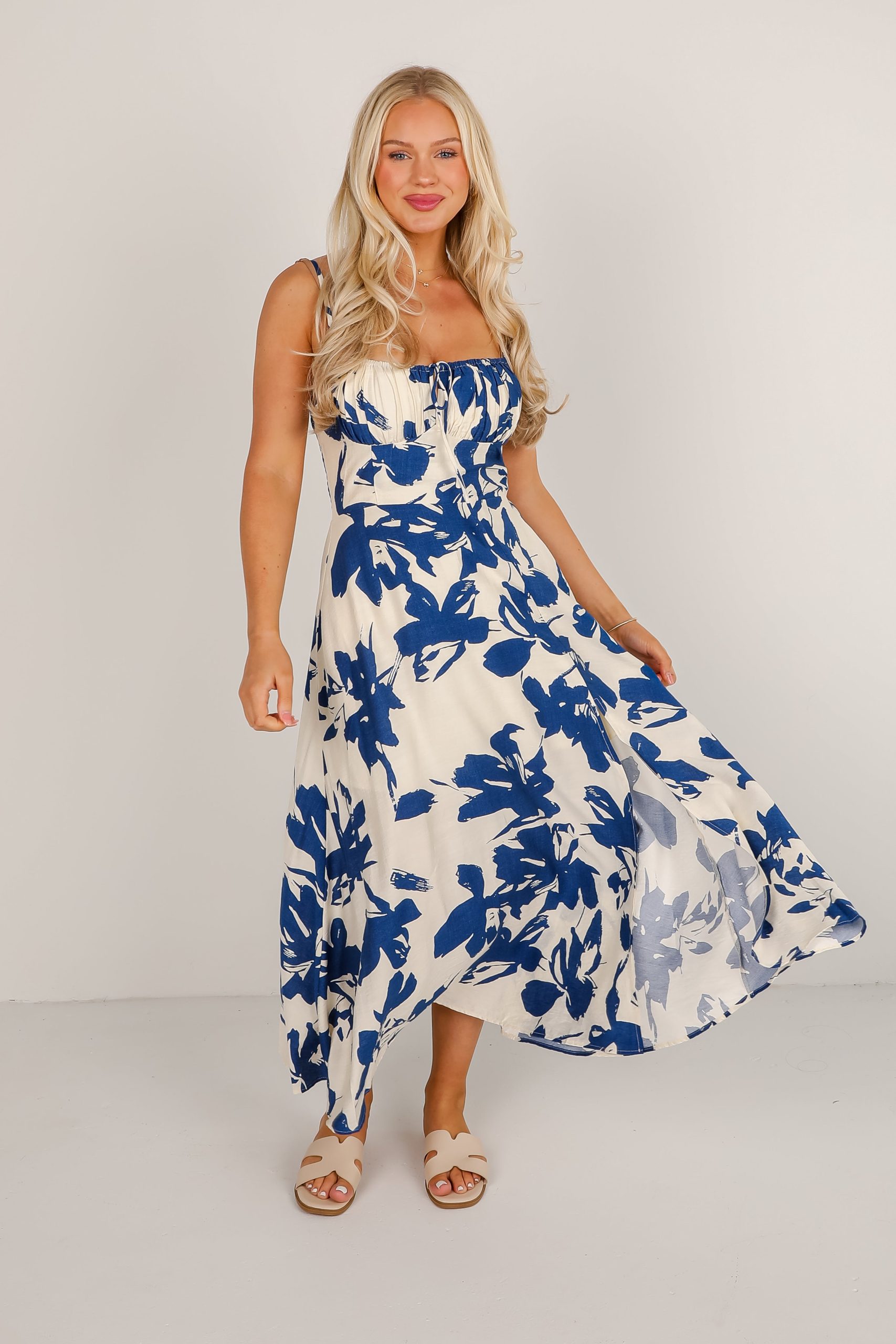 shopdressup_blue_floral_midi_dress_7fcf5279-0ead-4da0-9a80-3ae18df74d48.jpg